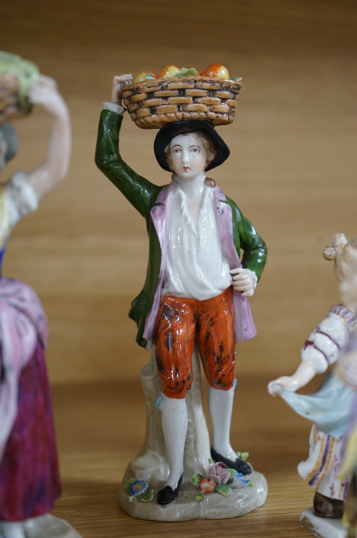 A collection of ten German and English porcelain figures and figure groups, mainly late 19th century, to include Dresden, largest 17cm high